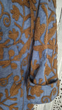 Uma embroidered jacket in denimblue with cinnamon embroidery. Lång broderad Uma kappa i ljus denimblå med brunt broderi. - Beställningsvara!